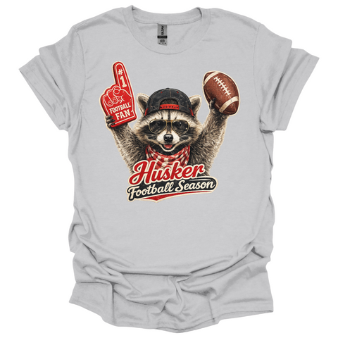Nebraska Football Season Raccoon T-Shirt | Funny Game Day Tee | Football Fan Graphic Shirt
