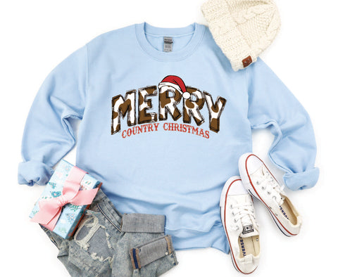 Merry Country Christmas crewneck with brown cow spots in the "Merry" text, perfect for adding a rustic, country-inspired touch to holiday attire.