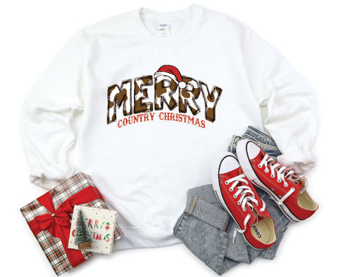 Merry Country Christmas crewneck with brown cow spots in the "Merry" text, perfect for adding a rustic, country-inspired touch to holiday attire.