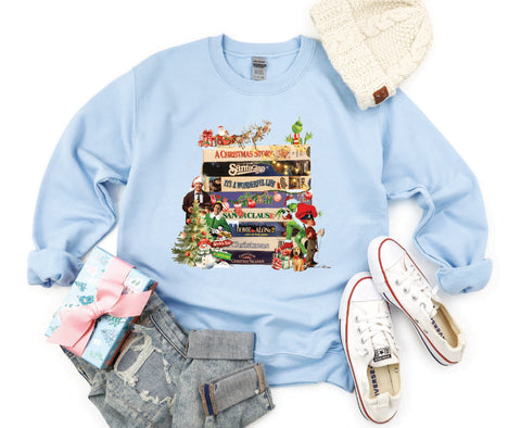 2024 Vintage Christmas VHS sweatshirt with a retro design inspired by 90s holiday movies, perfect for fans of vintage Christmas nostalgia.

