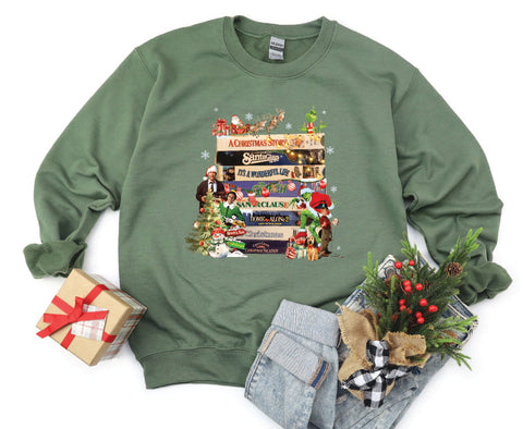 2024 Vintage Christmas VHS sweatshirt with a retro design inspired by 90s holiday movies, perfect for fans of vintage Christmas nostalgia.


